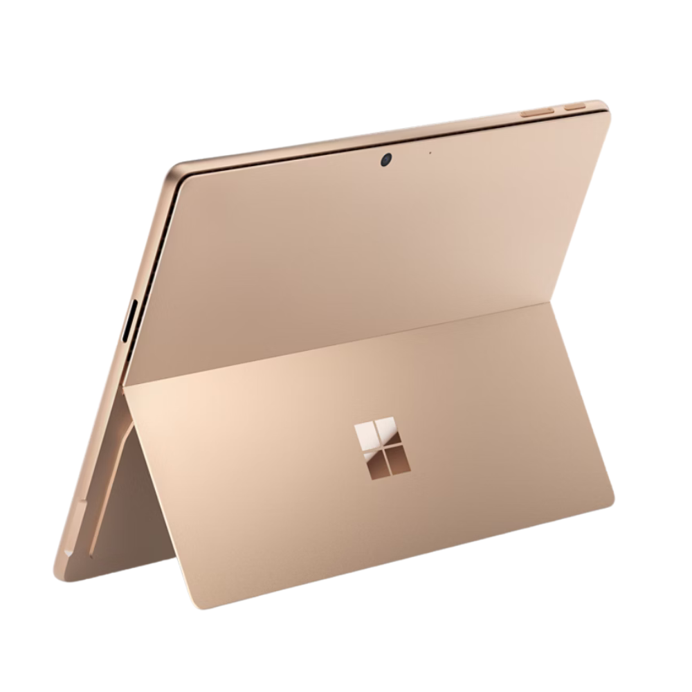 Microsoft Surface Pro 11 in Dune, rear three-quarter view with kickstand open.