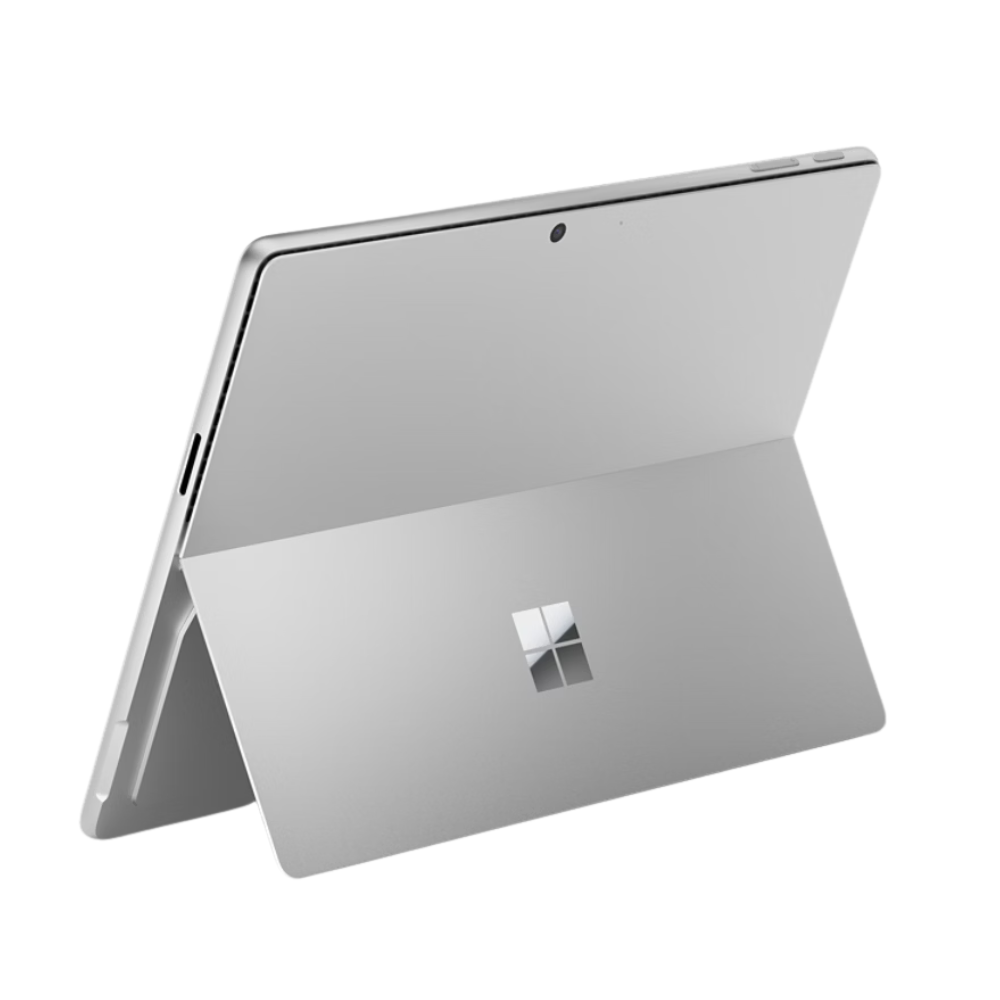 Microsoft Surface Pro 11 in Platinum, rear three-quarter view with kickstand open.